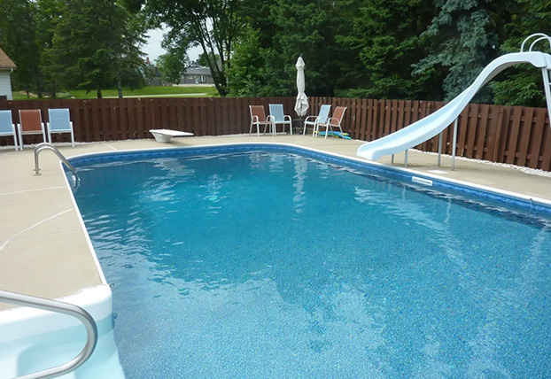 inground swimming pool with slide