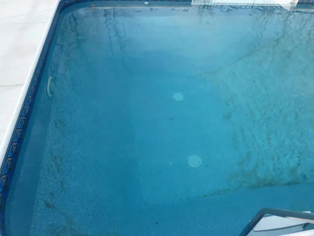 Water Force in the Deep End - Here you can see the dirt at the bottom of the pool being displaced by only the force of the water being pushed down by the Infusion Pool Returns.